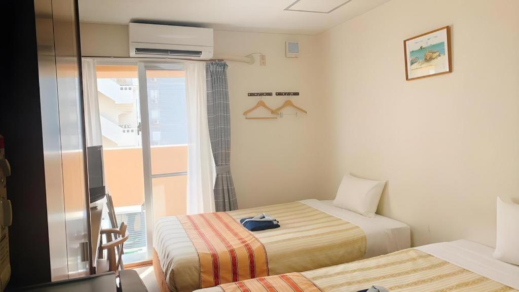 Hotel Peace Land Kume Наха Экстерьер фото