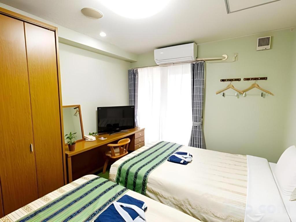 Hotel Peace Land Kume Наха Экстерьер фото