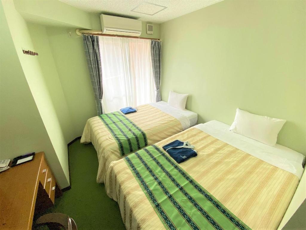 Hotel Peace Land Kume Наха Экстерьер фото